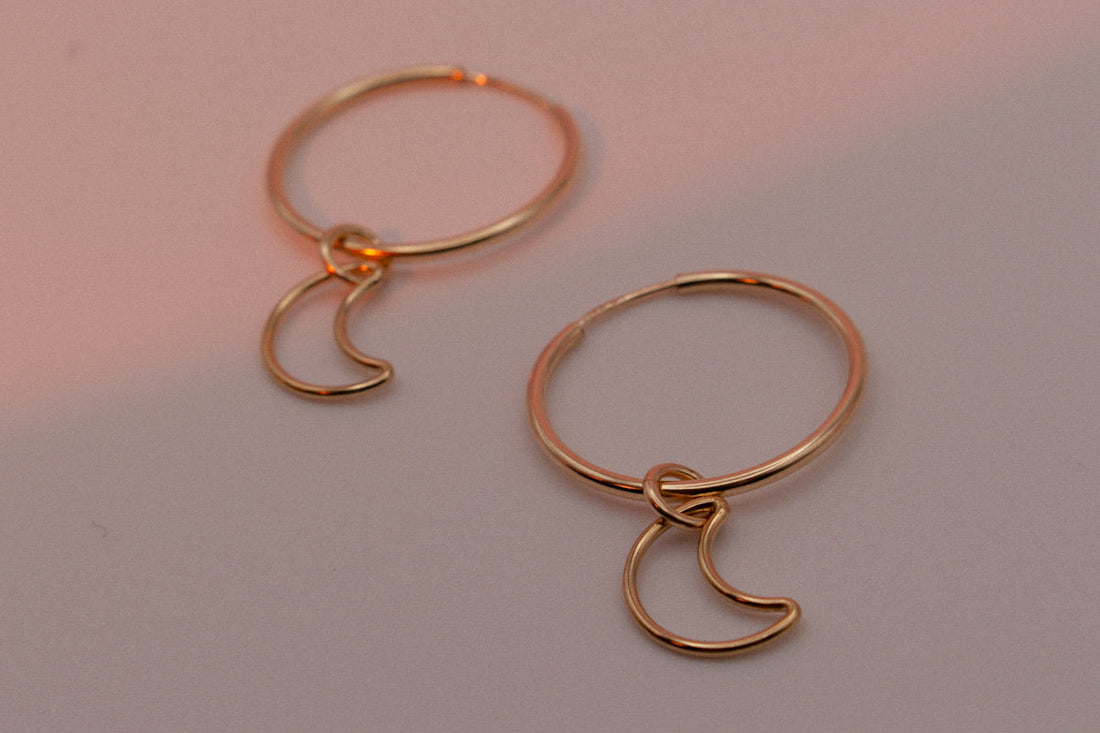 Gold filled hoop earrings with crescent moon charms